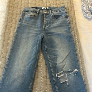 Re/done stovepipe Jean with ripped knee